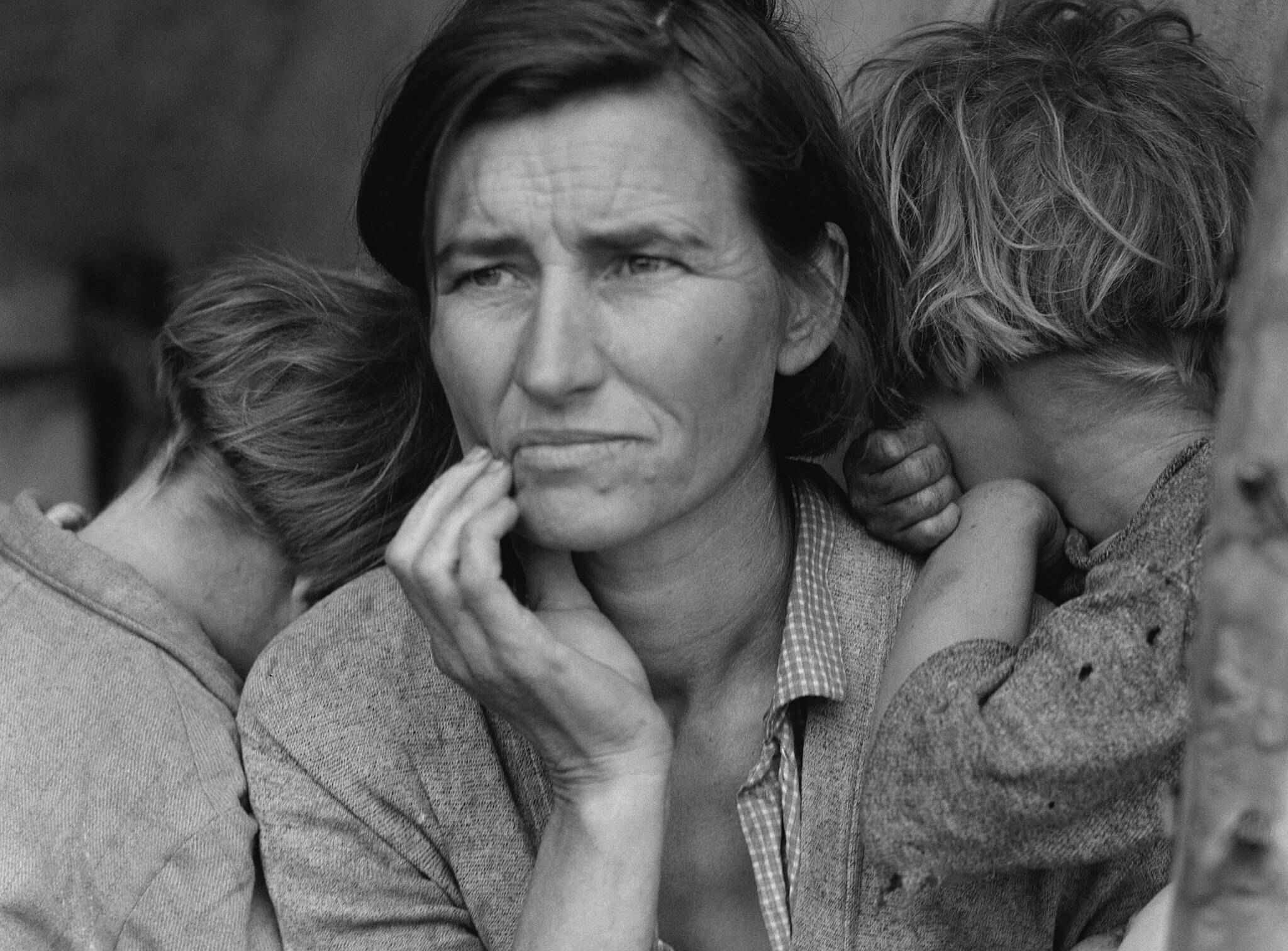 imagem de famílias migrantes do Dust Bowl viajando pelo país em busca de trabalho e melhores condições de vida
